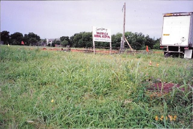Concrete foundation footings in a field.